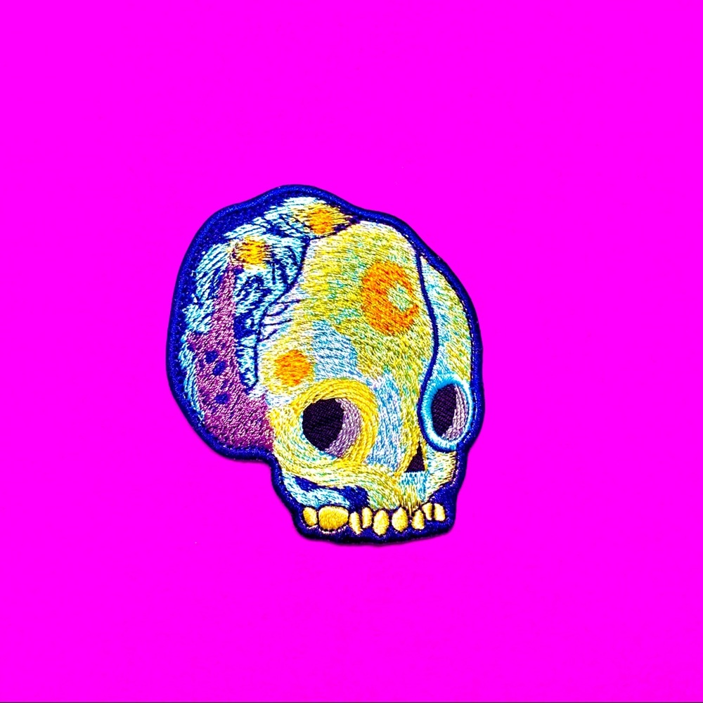 Artsy skull iron on patch
